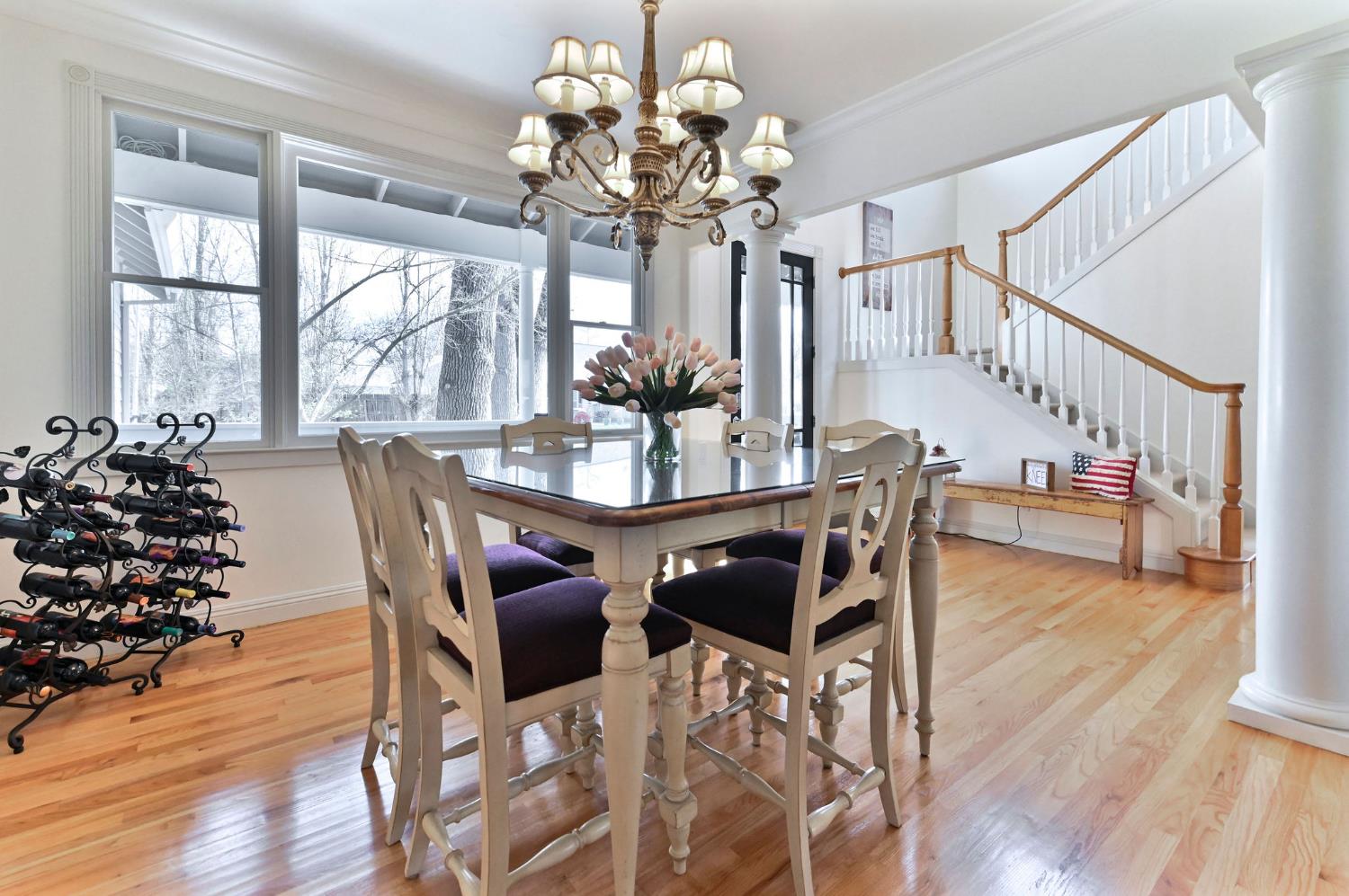 511 Surrey Lane Murphys, CA 95247 - Photo 26 of 97 a view of a dining room with furniture window and wooden floor