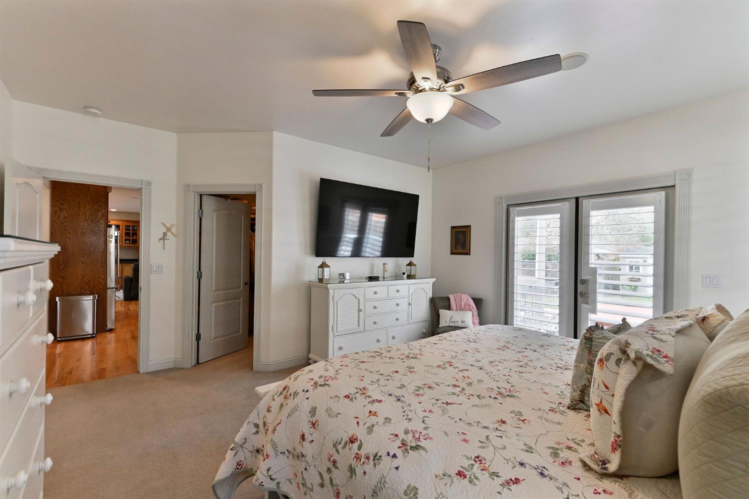 511 Surrey Lane Murphys, CA 95247 - Photo 29 of 97 a bedroom with a bed and a flat screen tv