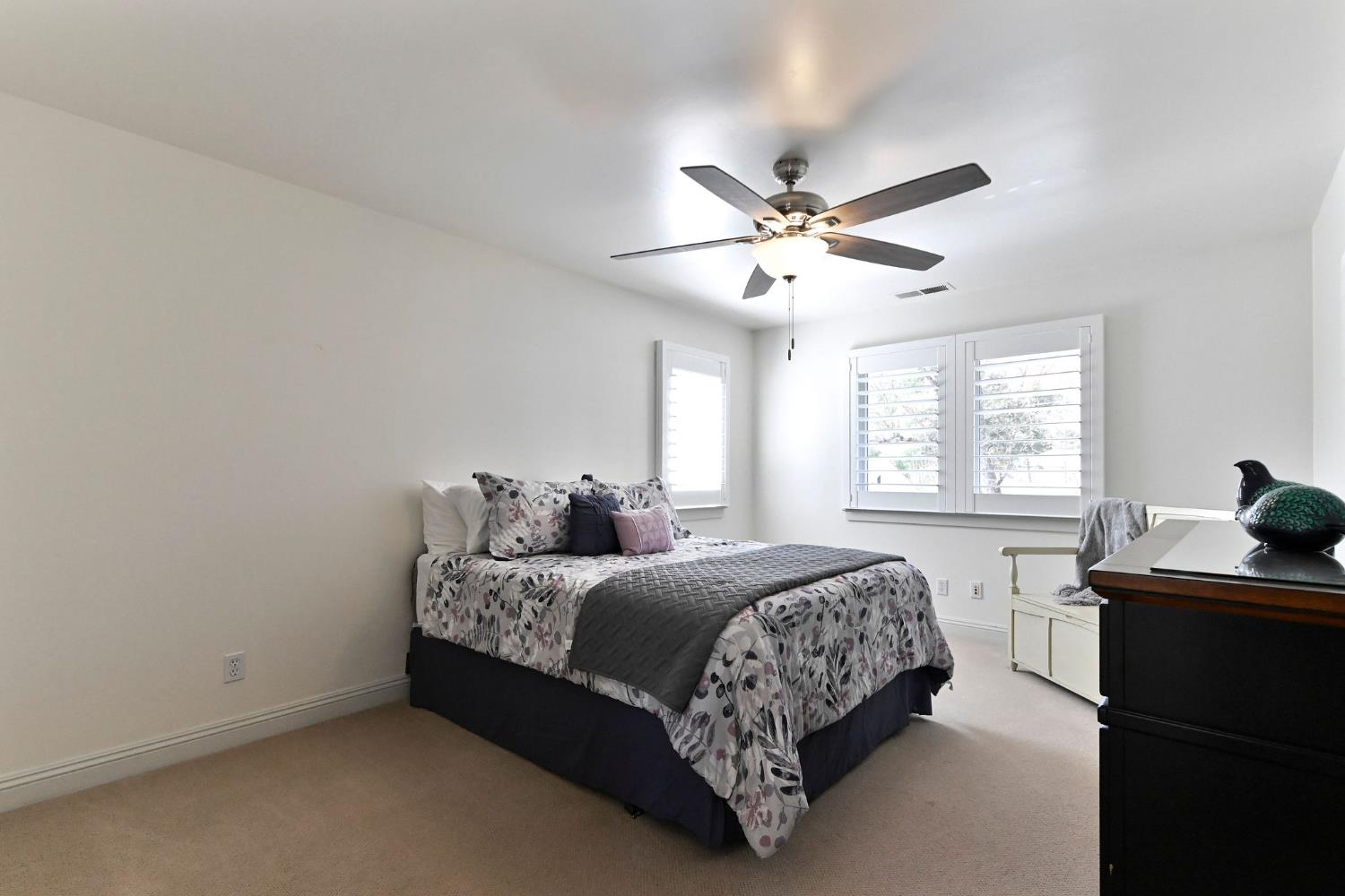 511 Surrey Lane Murphys, CA 95247 - Photo 40 of 97 a bedroom with a bed and a window