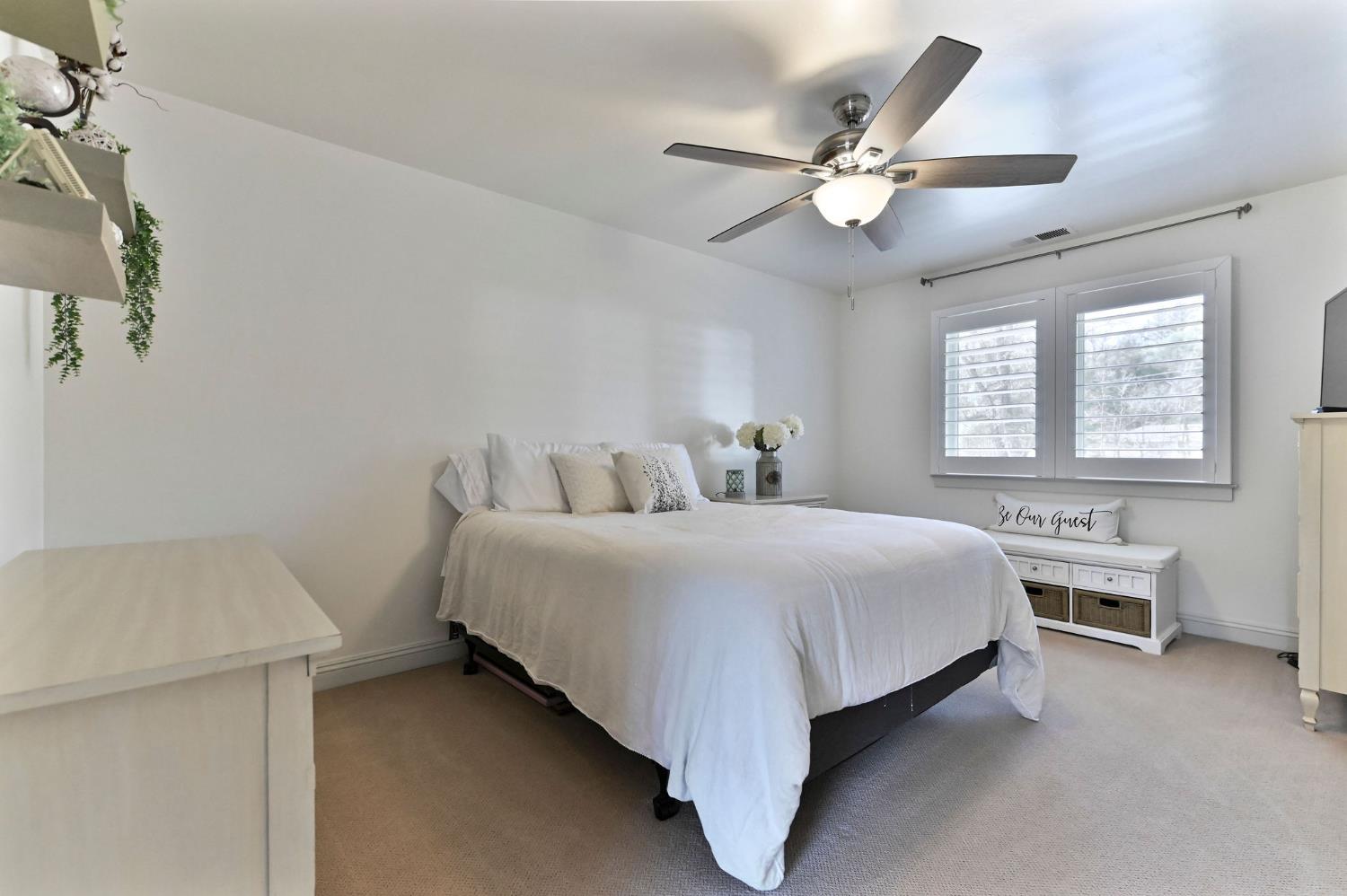 511 Surrey Lane Murphys, CA 95247 - Photo 42 of 97 a bedroom with a bed and window