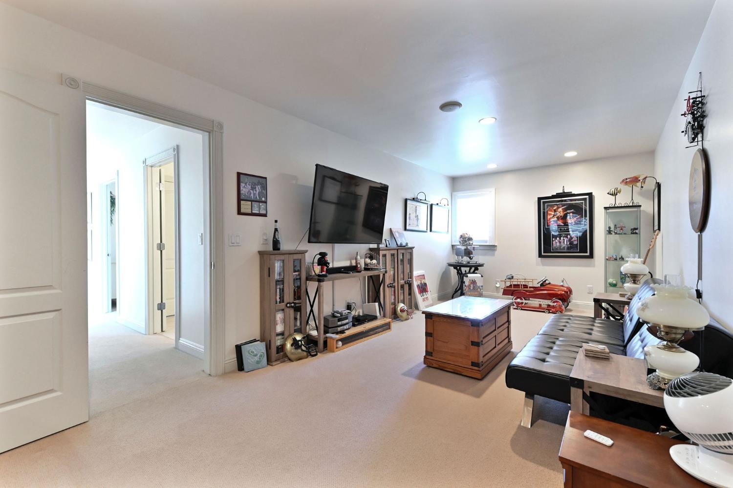 511 Surrey Lane Murphys, CA 95247 - Photo 48 of 97 a living room with furniture and a flat screen tv