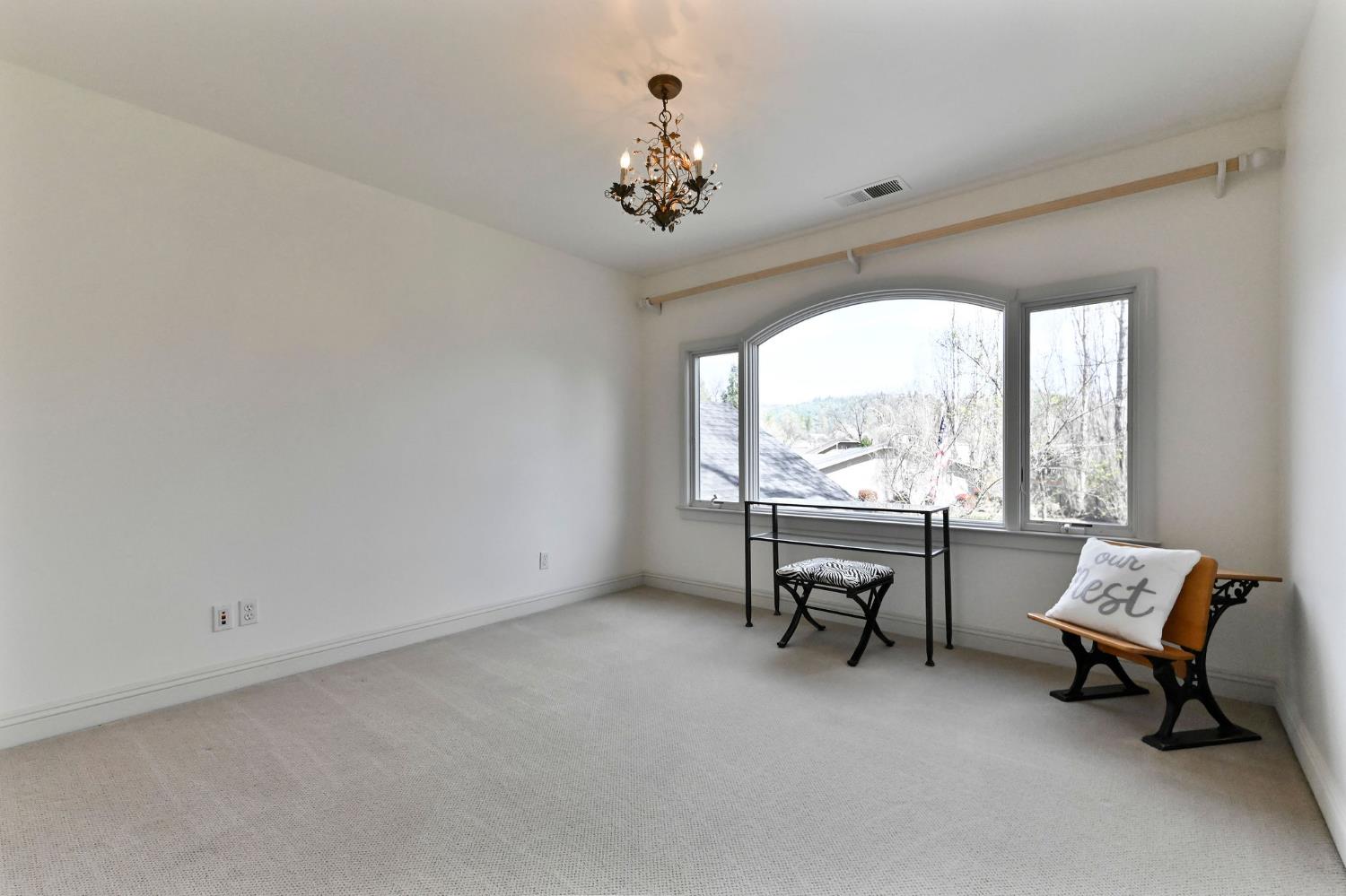 511 Surrey Lane Murphys, CA 95247 - Photo 50 of 97 a living room with furniture and a large window