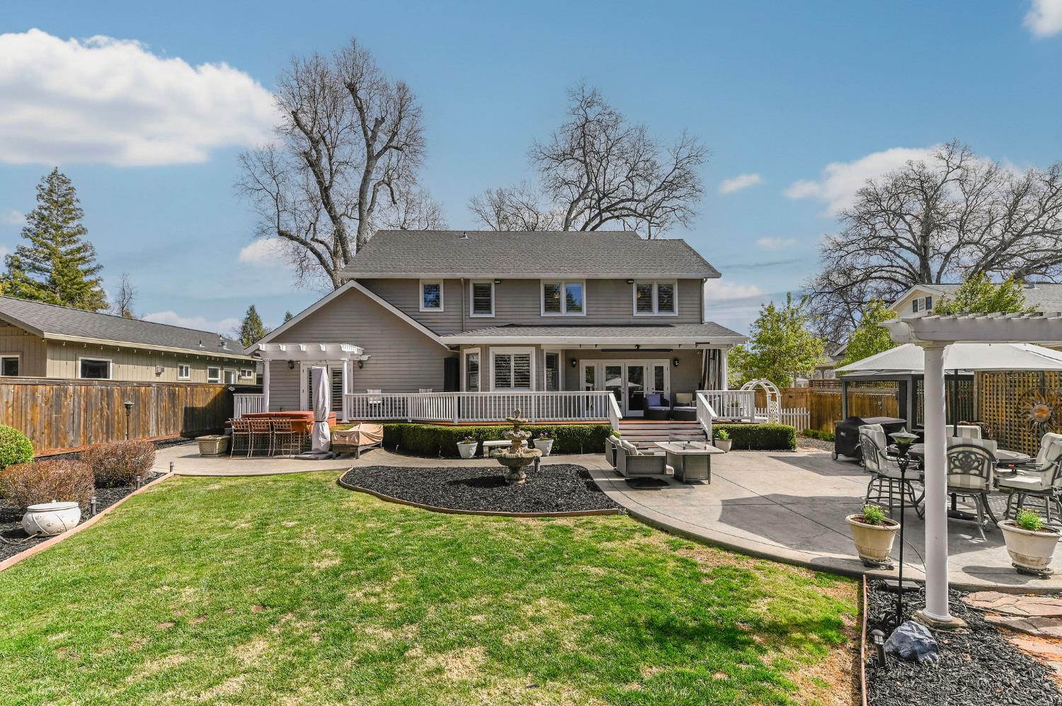 511 Surrey Lane Murphys, CA 95247 - Photo 65 of 97 a front view of a house with garden and sitting area