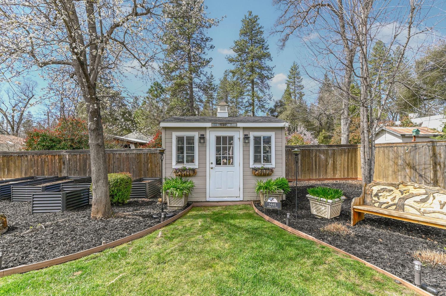 511 Surrey Lane Murphys, CA 95247 - Photo 73 of 97 a view of a house with backyard garden and plants