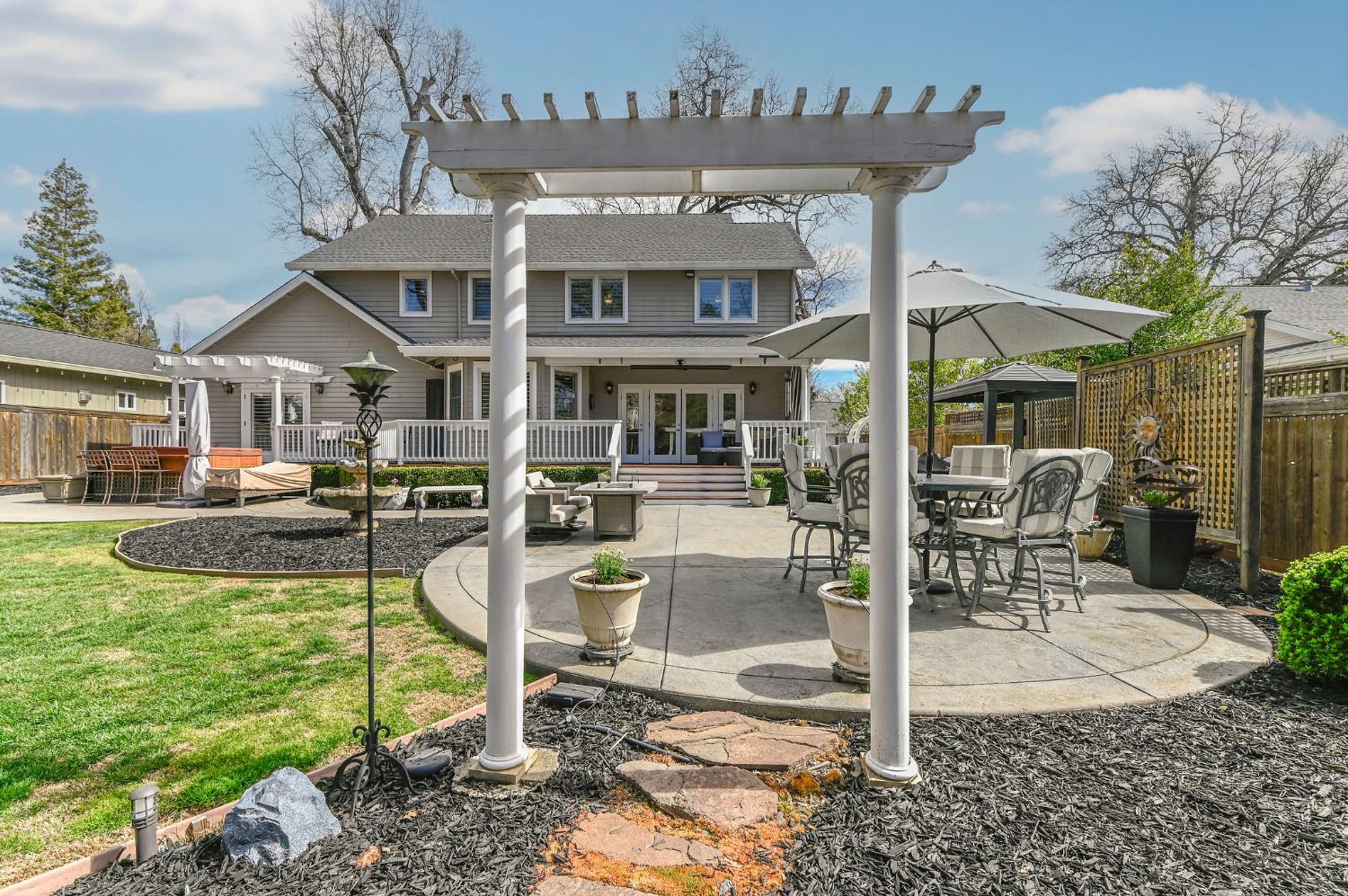 511 Surrey Lane Murphys, CA 95247 - Photo 76 of 97 a view of a house with backyard porch and sitting area