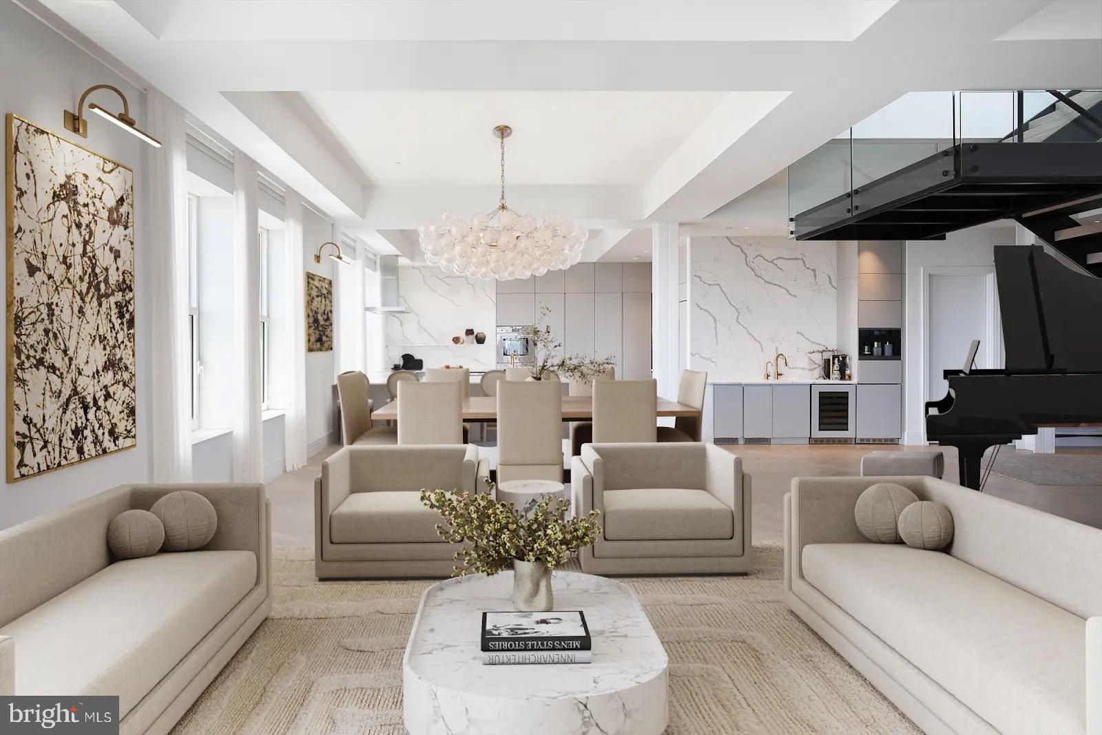 a living room with furniture and a chandelier
