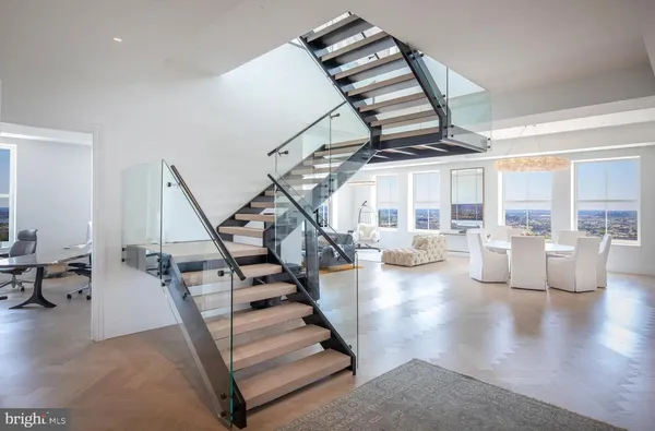 a spacious bathroom with a double vanity sink tub and a mirror