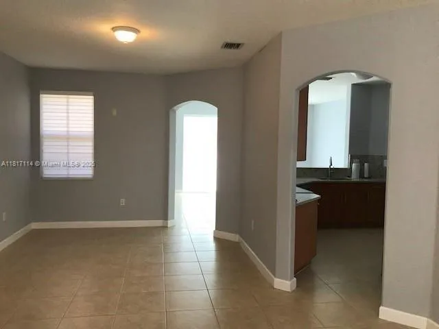 wooden floor and window in a room