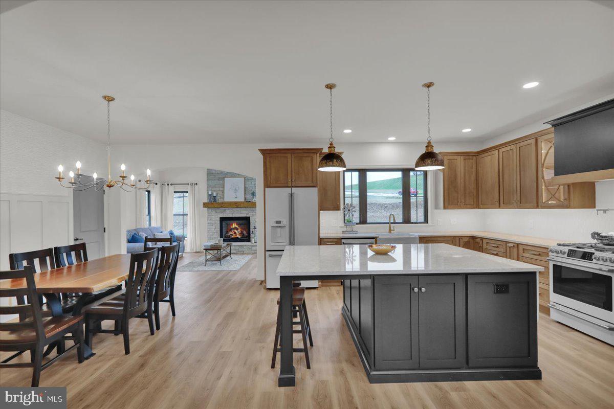2000 Rolling Meadow Road Lebanon, PA 17046 - Photo 15 of 66 a kitchen with stainless steel appliances granite countertop a kitchen island hardwood floor and a sink