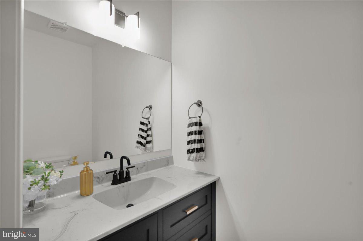 2000 Rolling Meadow Road Lebanon, PA 17046 - Photo 31 of 66 a bathroom with a sink and a mirror