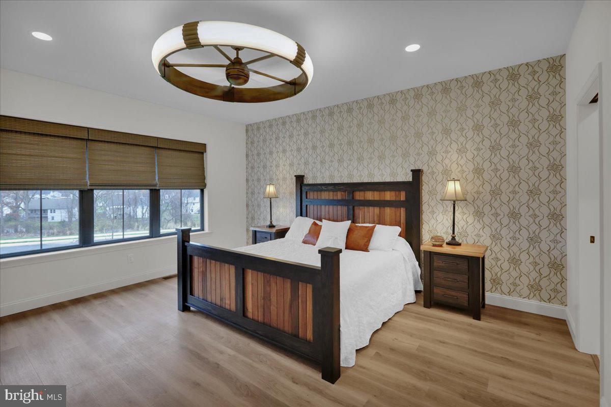 2000 Rolling Meadow Road Lebanon, PA 17046 - Photo 33 of 66 a bed room with a bed and a chandelier