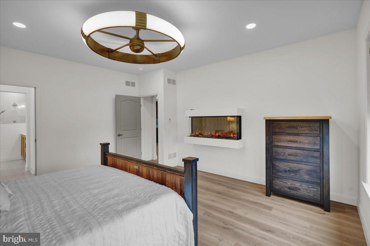 2000 Rolling Meadow Road Lebanon, PA 17046 - Photo 34 of 66 a bedroom with a bed and a chandelier