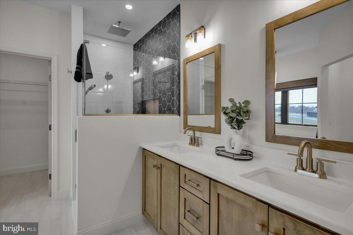 2000 Rolling Meadow Road Lebanon, PA 17046 - Photo 37 of 66 a bathroom with a sink and a mirror