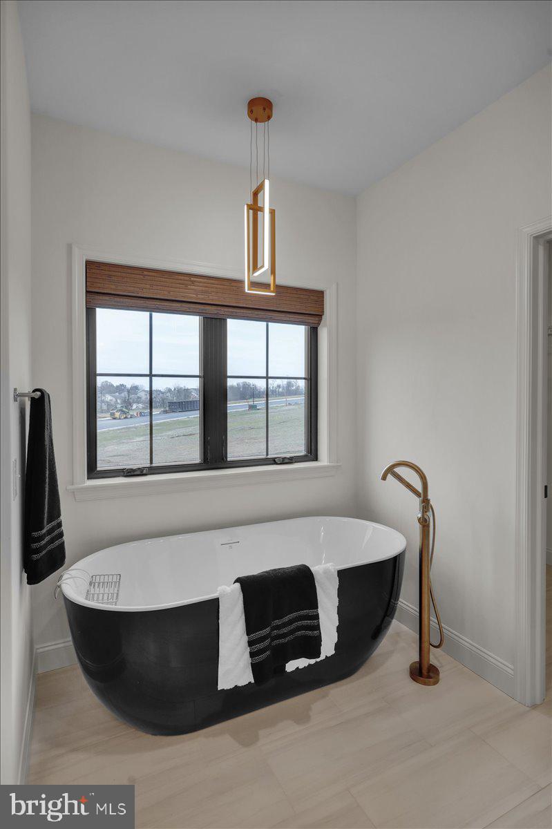 2000 Rolling Meadow Road Lebanon, PA 17046 - Photo 38 of 66 a spacious bathroom with a bathtub and window