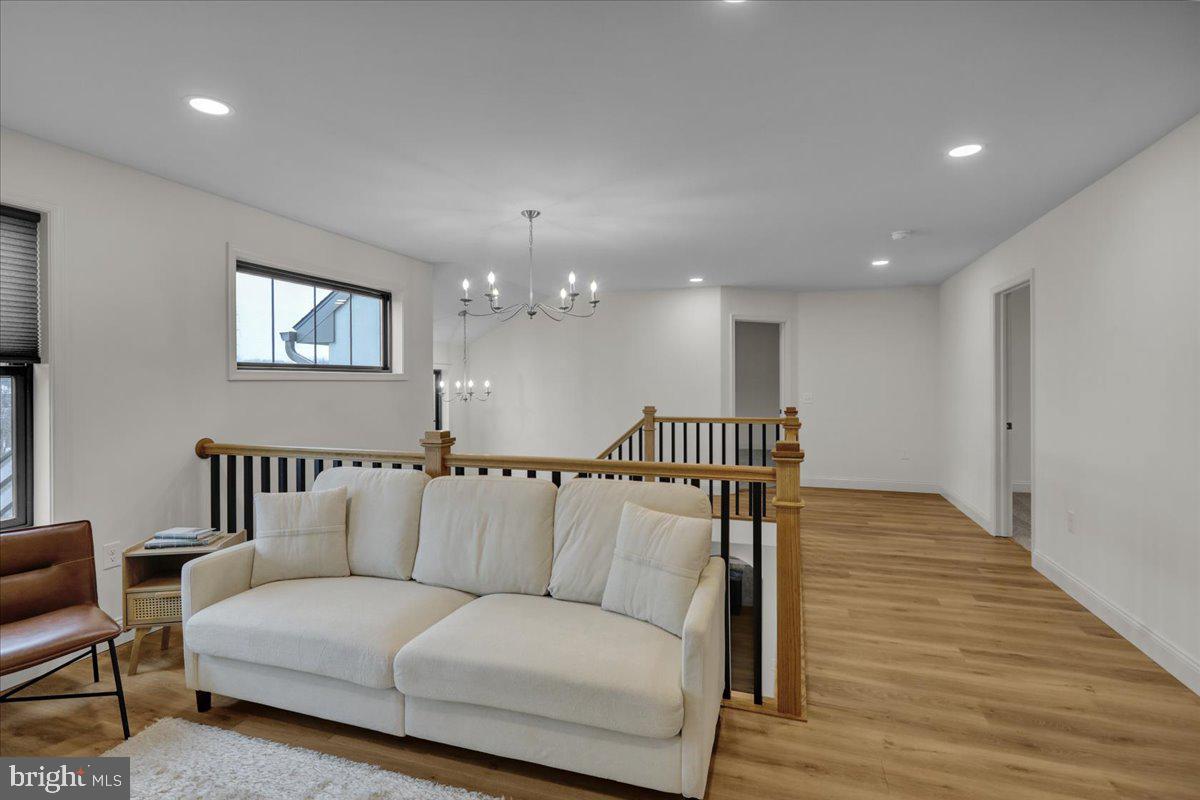 2000 Rolling Meadow Road Lebanon, PA 17046 - Photo 47 of 66 a living room with furniture and a chandelier