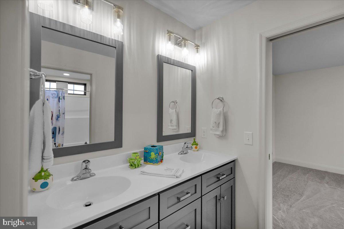 2000 Rolling Meadow Road Lebanon, PA 17046 - Photo 52 of 66 a bathroom with a sink double vanity and a mirror
