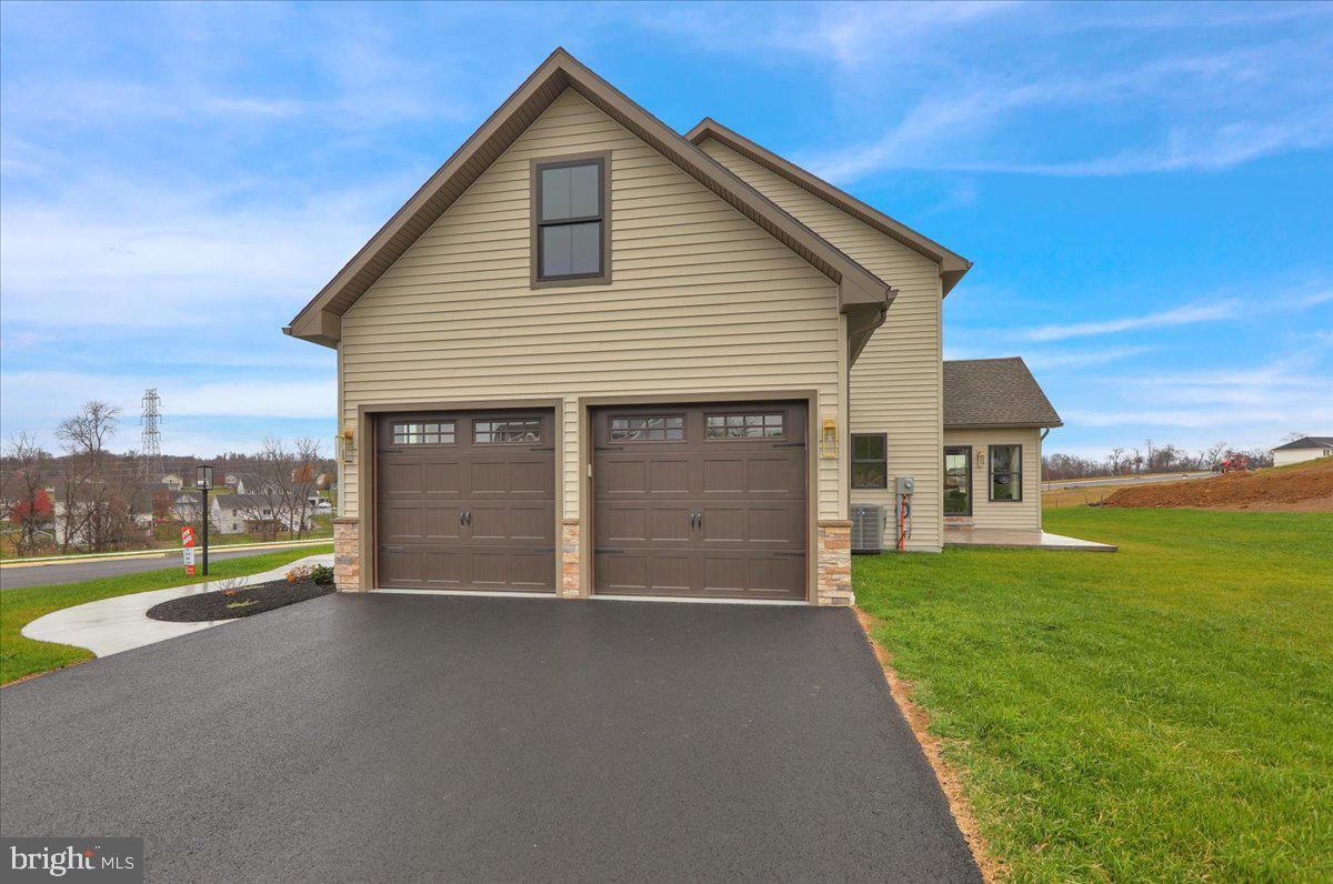 2000 Rolling Meadow Road Lebanon, PA 17046 - Photo 62 of 66 a view of a house with a yard and a garage
