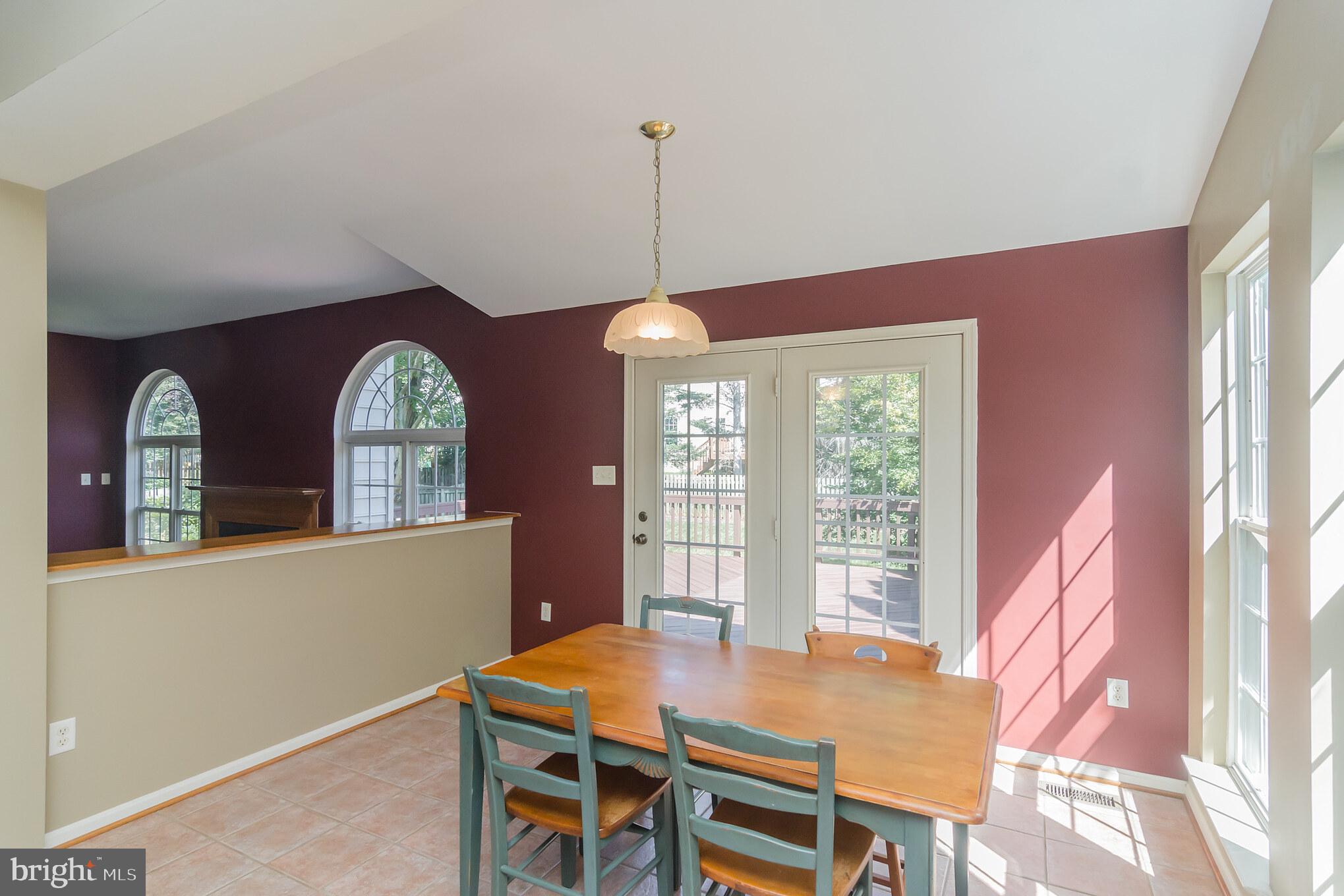 14001 Falconcrest Road Germantown, MD 20874 - Photo 8 of 30 Sunny Breakfast room opens to family room