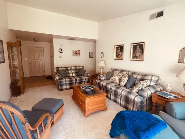 a living room with furniture and a couch