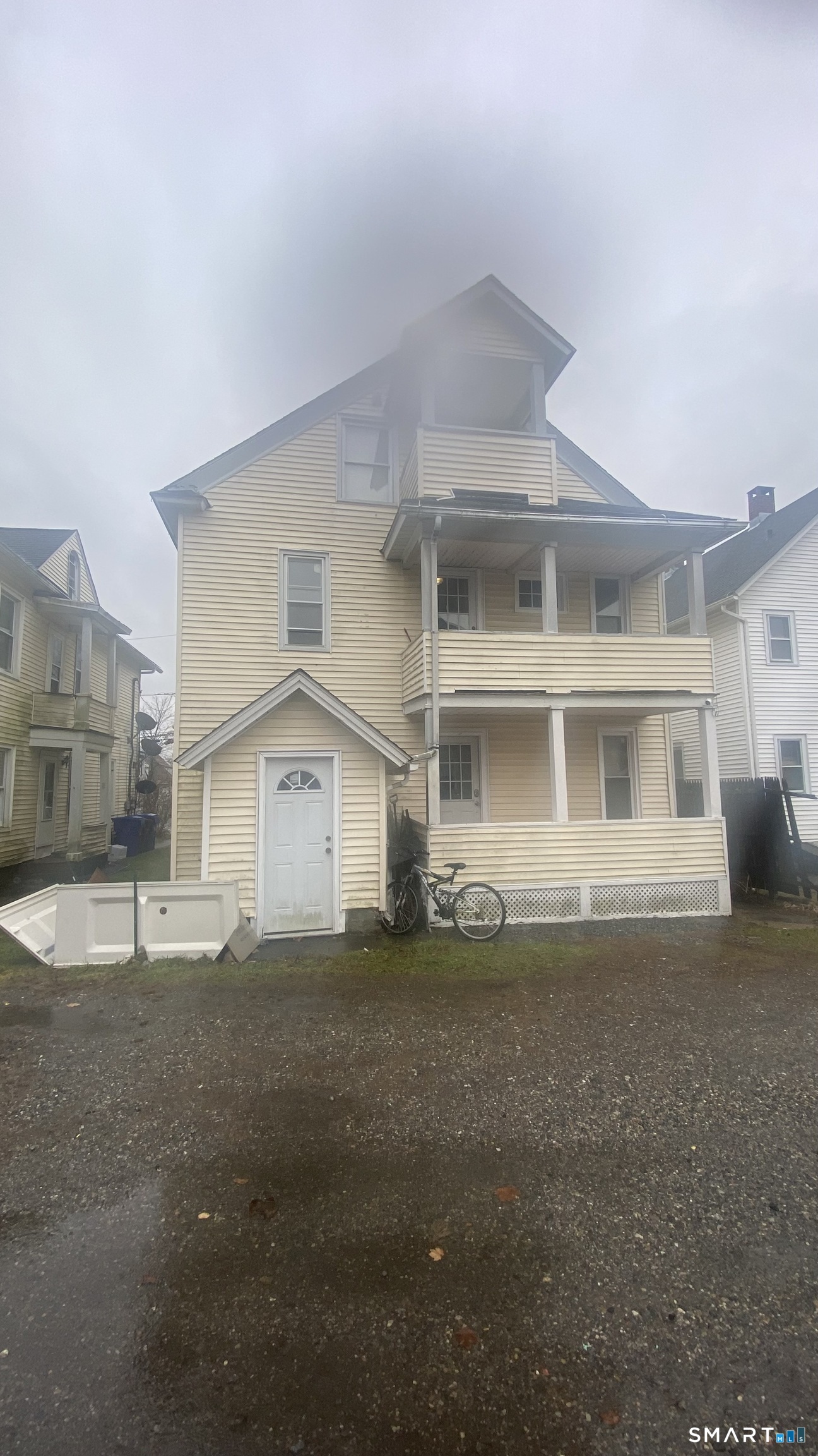 82 James Street, Unit 2 Torrington, CT 06790 - Photo 2 of 23 a view of a house with a yard