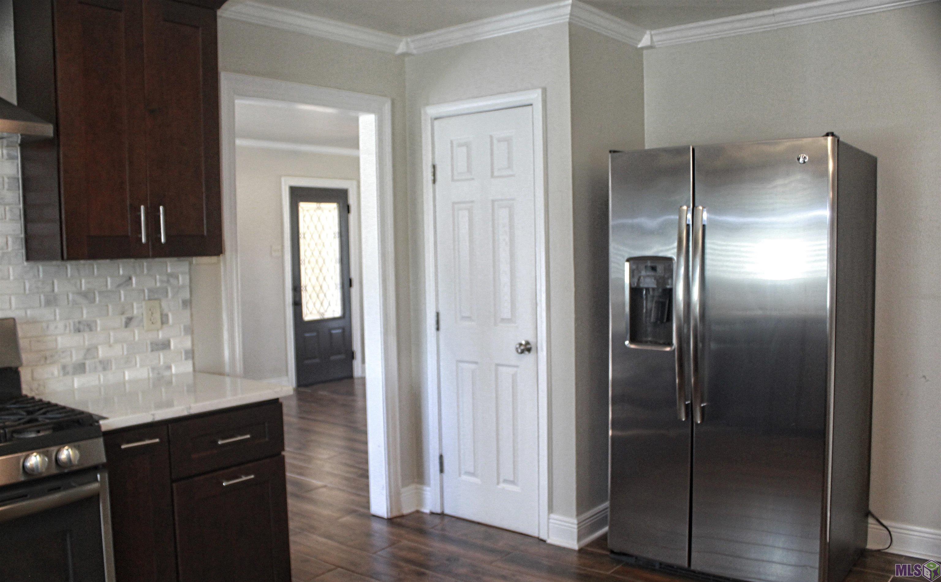 317 Oak Street Denham Springs, LA 70726 - Photo 9 of 37 Kitchen/Fridge