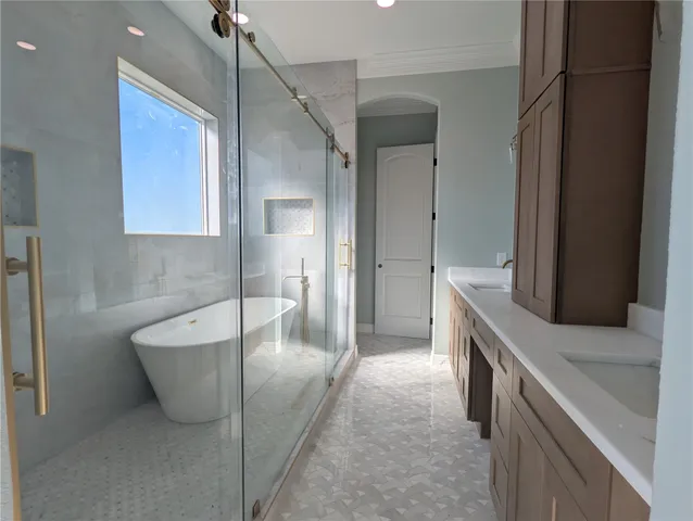 a balcony with table and chairs