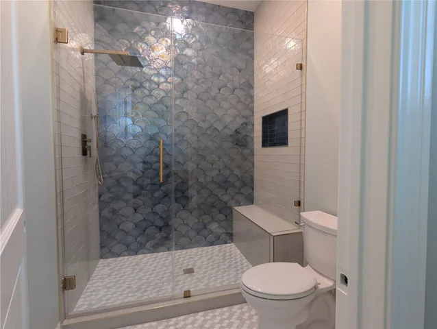 front view of a house with a deck