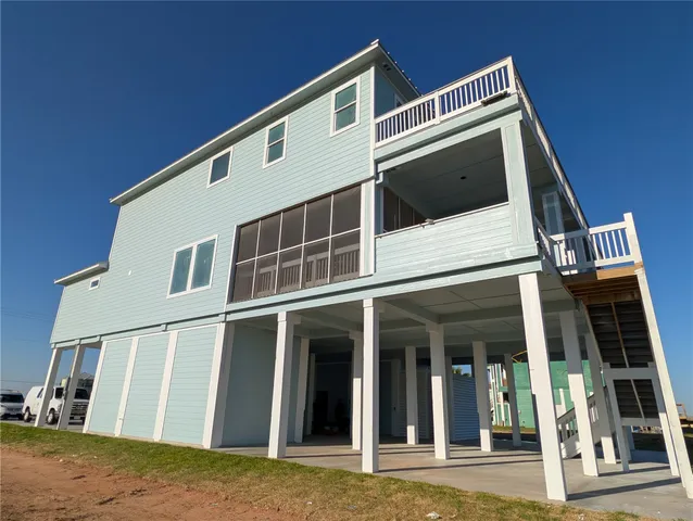 a view of a balcony with ocean view