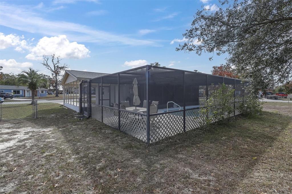 3409 Plaza Avenue Spring Hill, FL 34608 - Photo 40 of 41 a view of a wrought iron fences in front of house