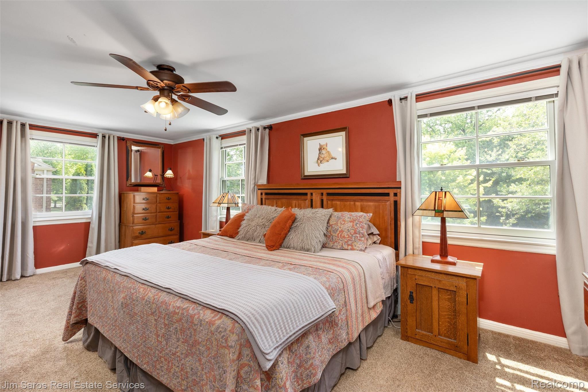 820 Westchester Road Grosse Pointe, MI 48230 - Photo 18 of 33 Bedroom featuring light colored carpet, multiple windows, and a ceiling fan