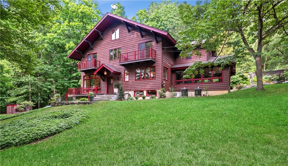 167 Parkview Road North Pound Ridge, NY 10576 - Photo 1 of 1 a front view of a house with garden