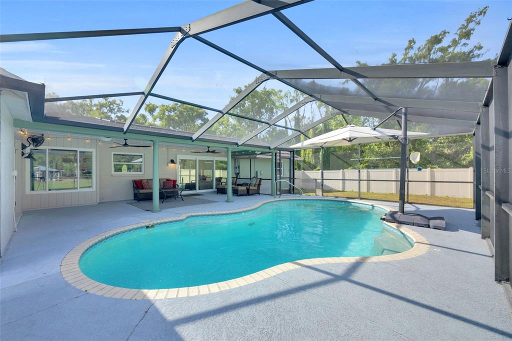 3535 Moores Lake Road Dover, FL 33527 - Photo 50 of 85 The large umbrella and child safety fence will stay.