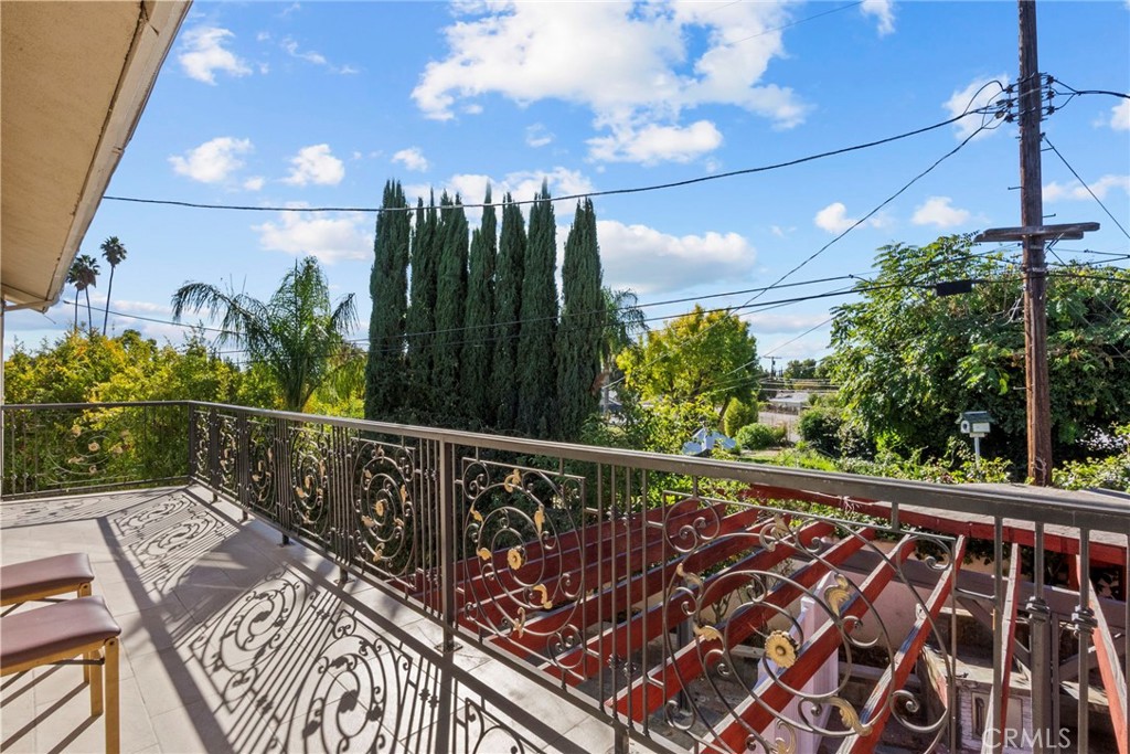 7839 Lena Avenue West Hills, CA 91304 - Photo 19 of 65 a view of a balcony with potted plants