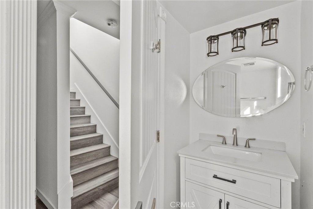7839 Lena Avenue West Hills, CA 91304 - Photo 22 of 65 a en suite bathroom with a sink and a mirror