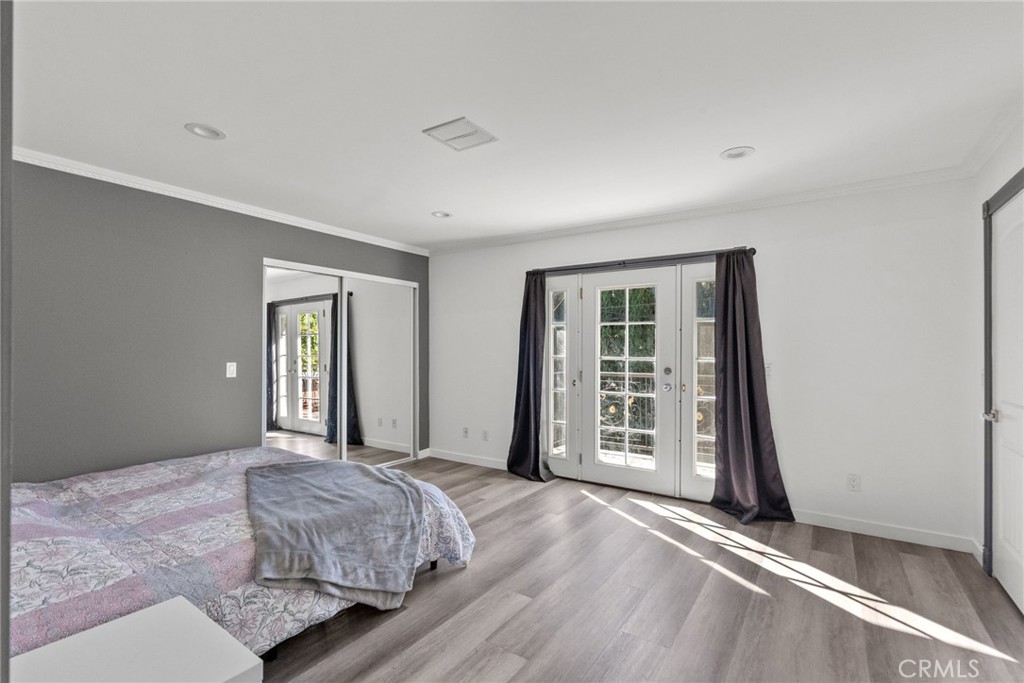 7839 Lena Avenue West Hills, CA 91304 - Photo 36 of 65 a bedroom with a bed and a window