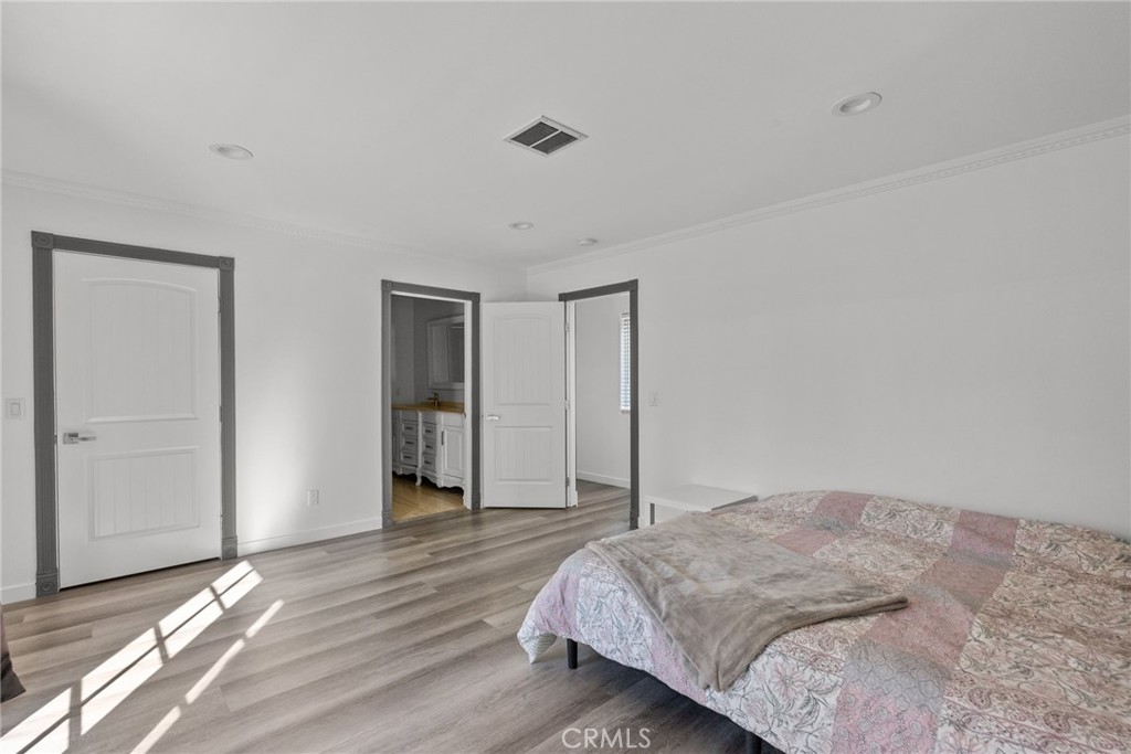 7839 Lena Avenue West Hills, CA 91304 - Photo 37 of 65 a bedroom with a bed and a window