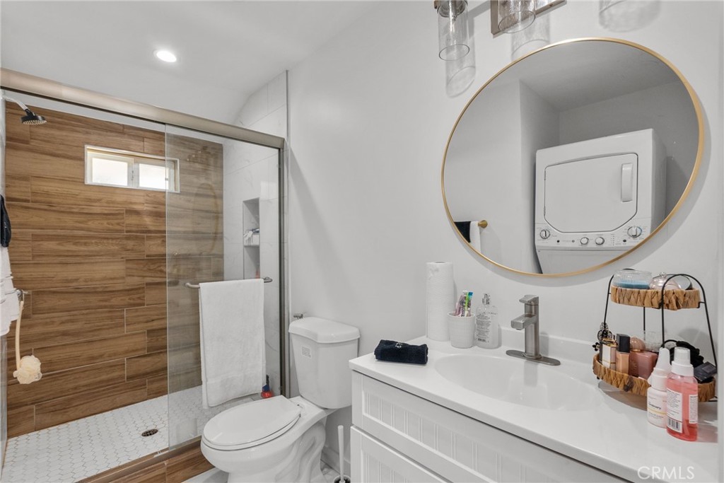 7839 Lena Avenue West Hills, CA 91304 - Photo 61 of 65 a bathroom with a sink a toilet and a mirror