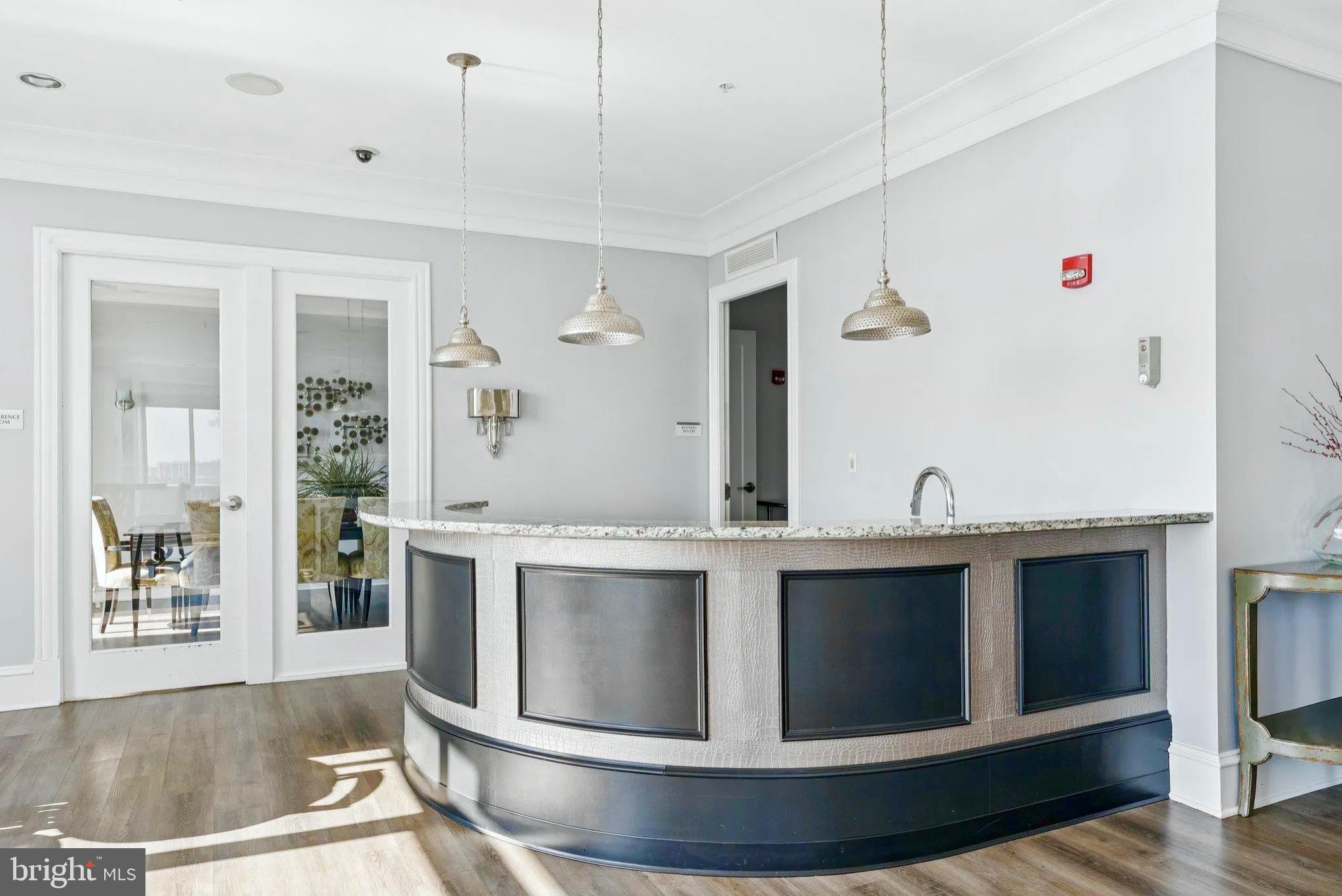 851 North Glebe Road, Unit 1712 Arlington, VA 22203 - Photo 14 of 25 a view of living room with stainless steel appliances granite countertop furniture and a fireplace