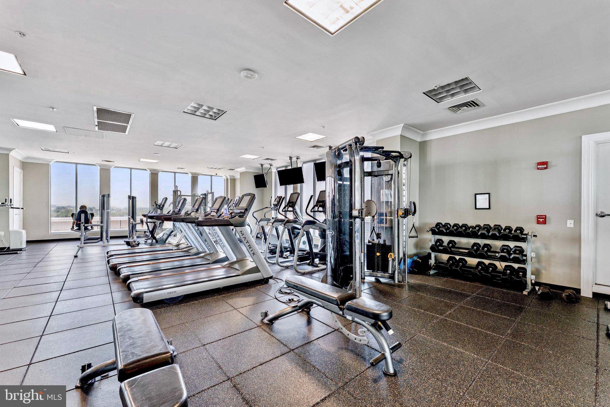 851 North Glebe Road, Unit 1712 Arlington, VA 22203 - Photo 18 of 25 a view of a room with gym equipment