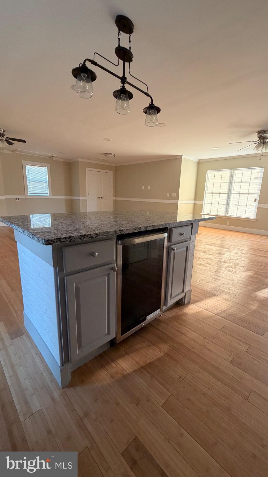 1110 High Street Cambridge, MD 21613 - Photo 19 of 22 Modern kitchen with sleek island design.