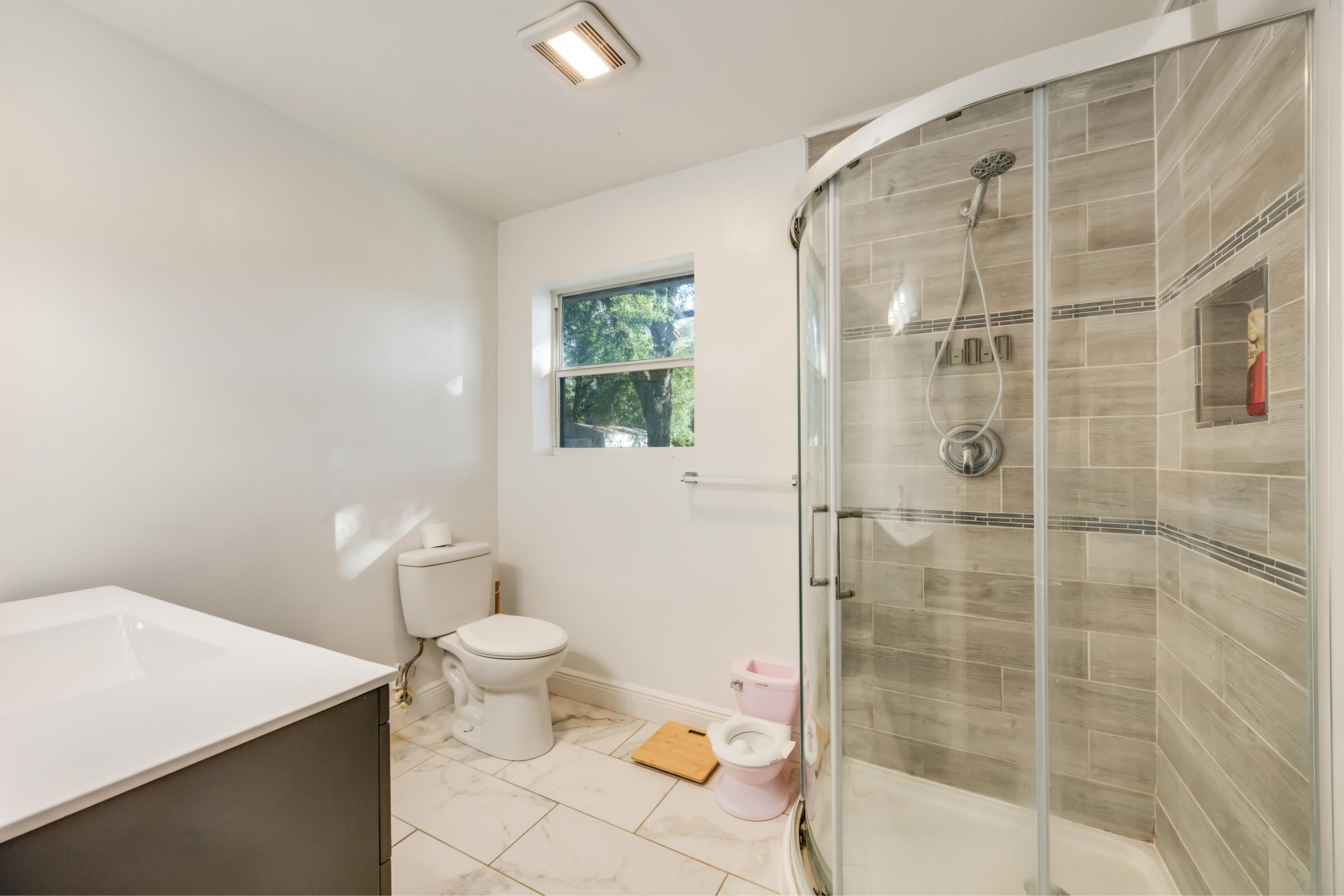 966 Valley Road Crestview, FL 32539 - Photo 26 of 32 a bathroom with a toilet and a shower