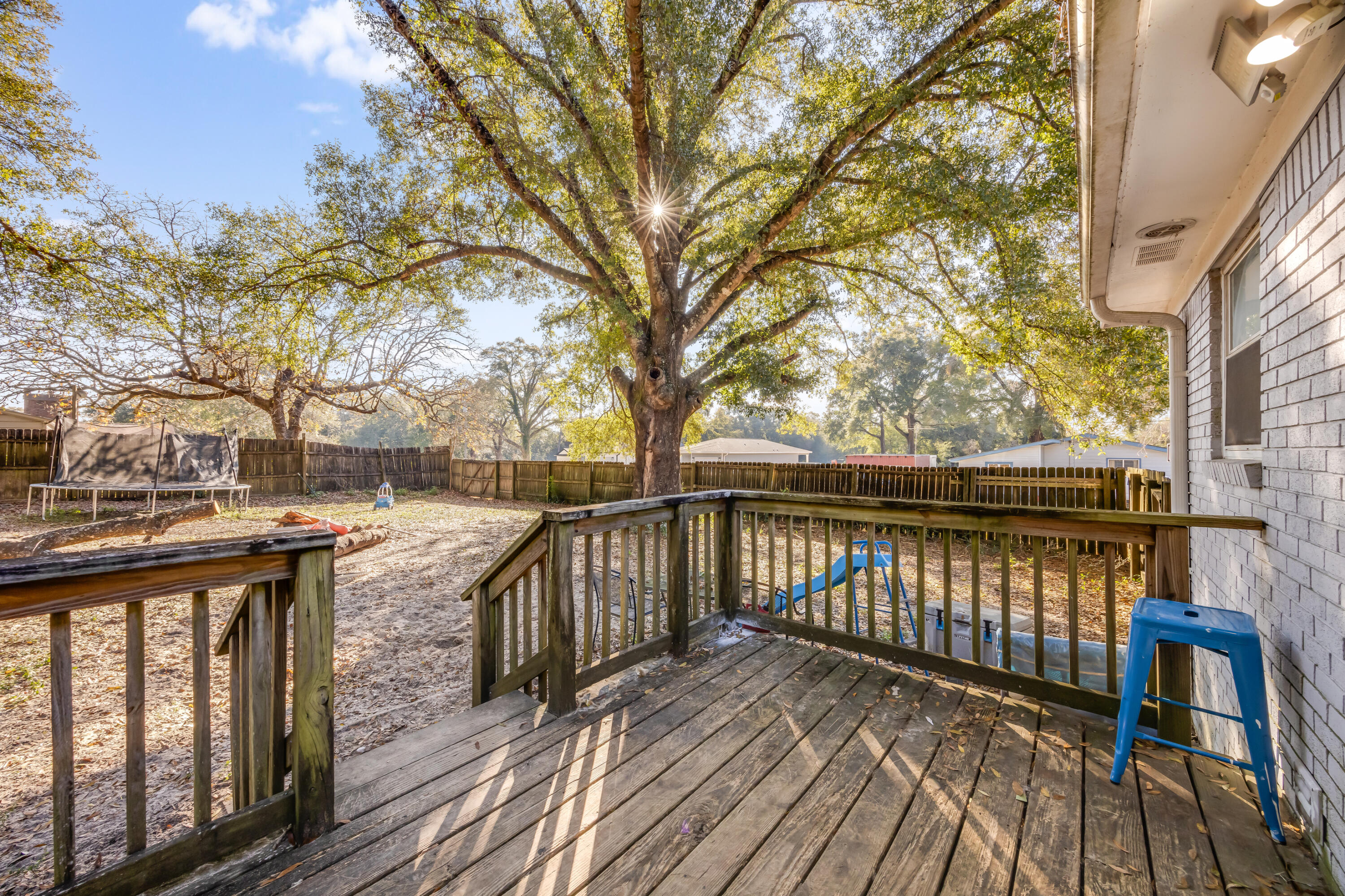 966 Valley Road Crestview, FL 32539 - Photo 10 of 32 a view of balcony with wooden floor and fence