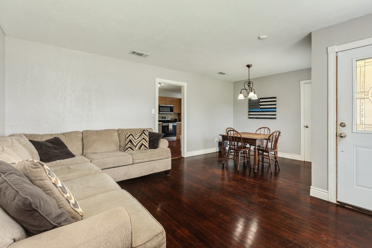 2109 North Tinsley Street Angleton, TX 77515 - Photo 12 of 27 a living room with furniture and wooden floor