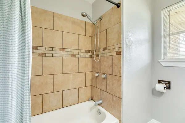 a bathroom with a bathtub