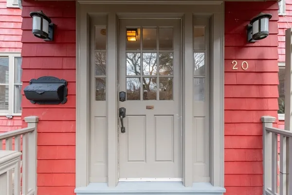 a view of a door and a window