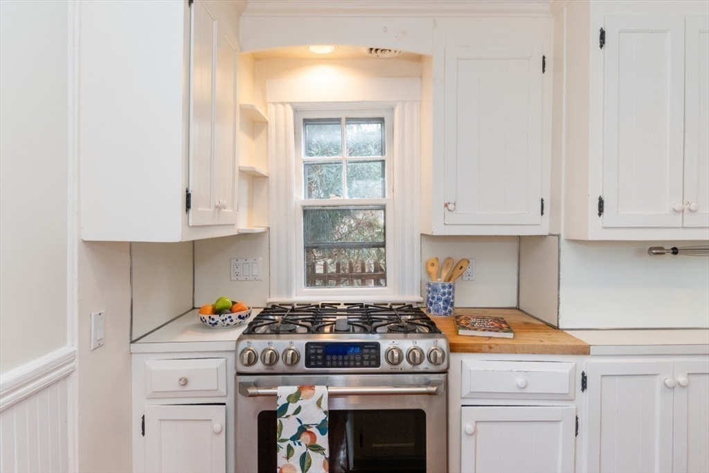 20 Maynard Place Cambridge, MA 02138 - Photo 13 of 42 a stove top oven sitting inside of a kitchen