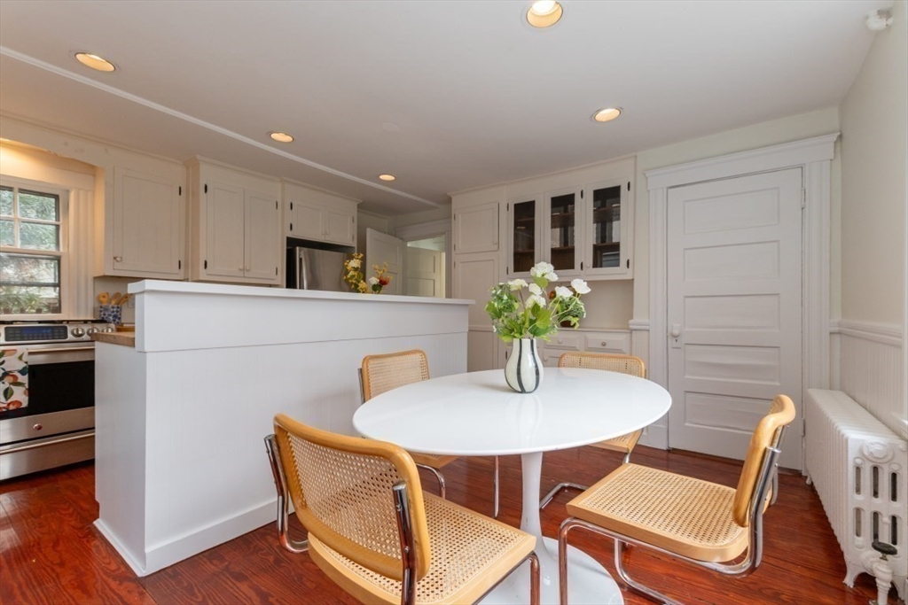 20 Maynard Place Cambridge, MA 02138 - Photo 16 of 42 a living room with furniture and a table
