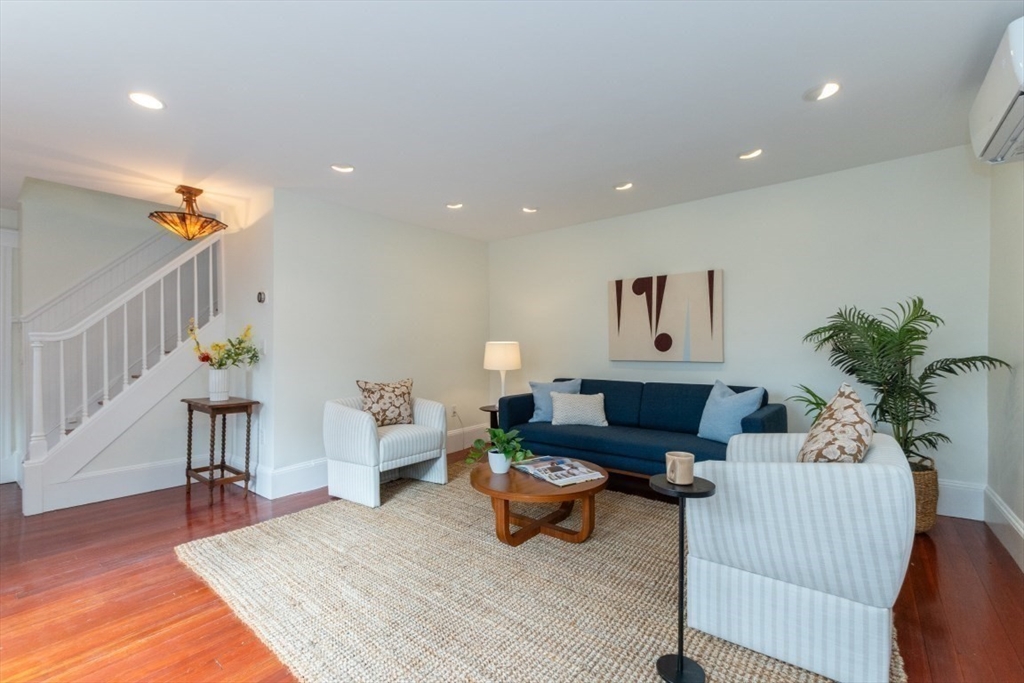 20 Maynard Place Cambridge, MA 02138 - Photo 8 of 42 a living room with furniture flowerpot and wooden floor
