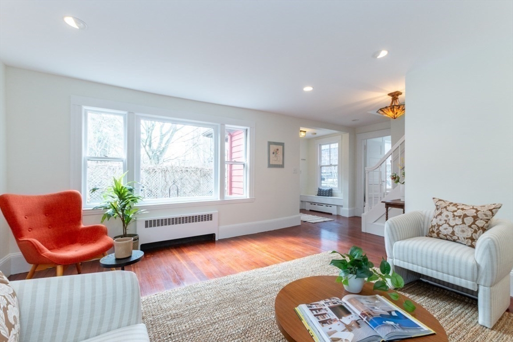 20 Maynard Place Cambridge, MA 02138 - Photo 9 of 42 a living room with furniture and a large window