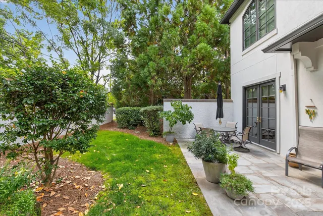 a view of yard with patio